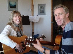 Michele taking a guitar lesson with Steve Giltrow